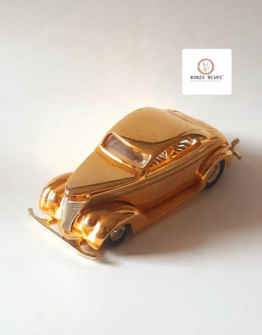 '37 Ford (24K Gold) - Racing Champions - Hot Rod Magazine 50th Anniversary Collector Series (1997 Released) (As per picture)