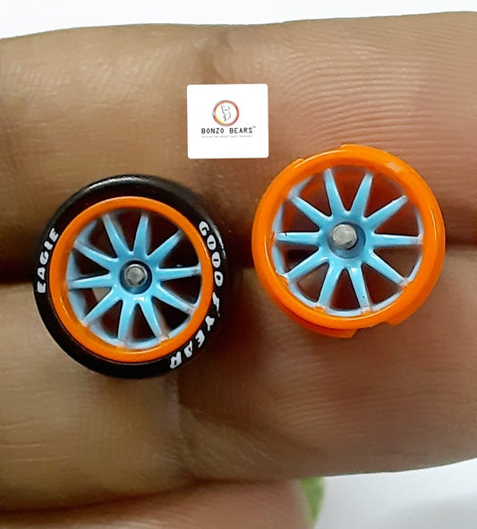 Rubber Tyre - 10mm, Orange Rim Blue Multispoke with Goodyear Eagle - 25mm axle | Cv1