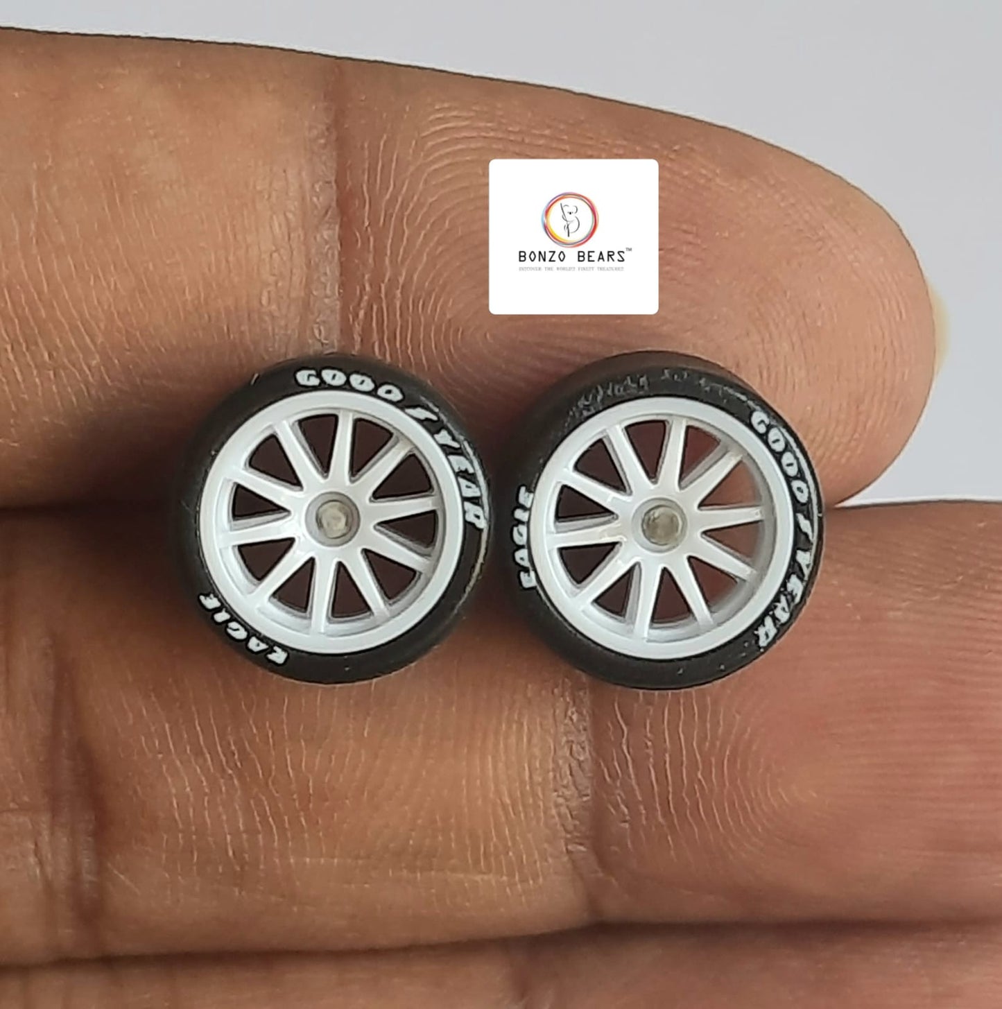 Rubber Tyre - 10mm White Rim 10 spoke with Goodyear Eagle - 25mm Axle Cv1