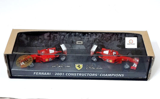Rare Hot Wheels 1:43 Elite Formula 1 Ferrari 2001 Constructors' Champions - Ferrari's 2001 Championship victory Michael Schumacher and Rubens Barrichello with Outer Cover