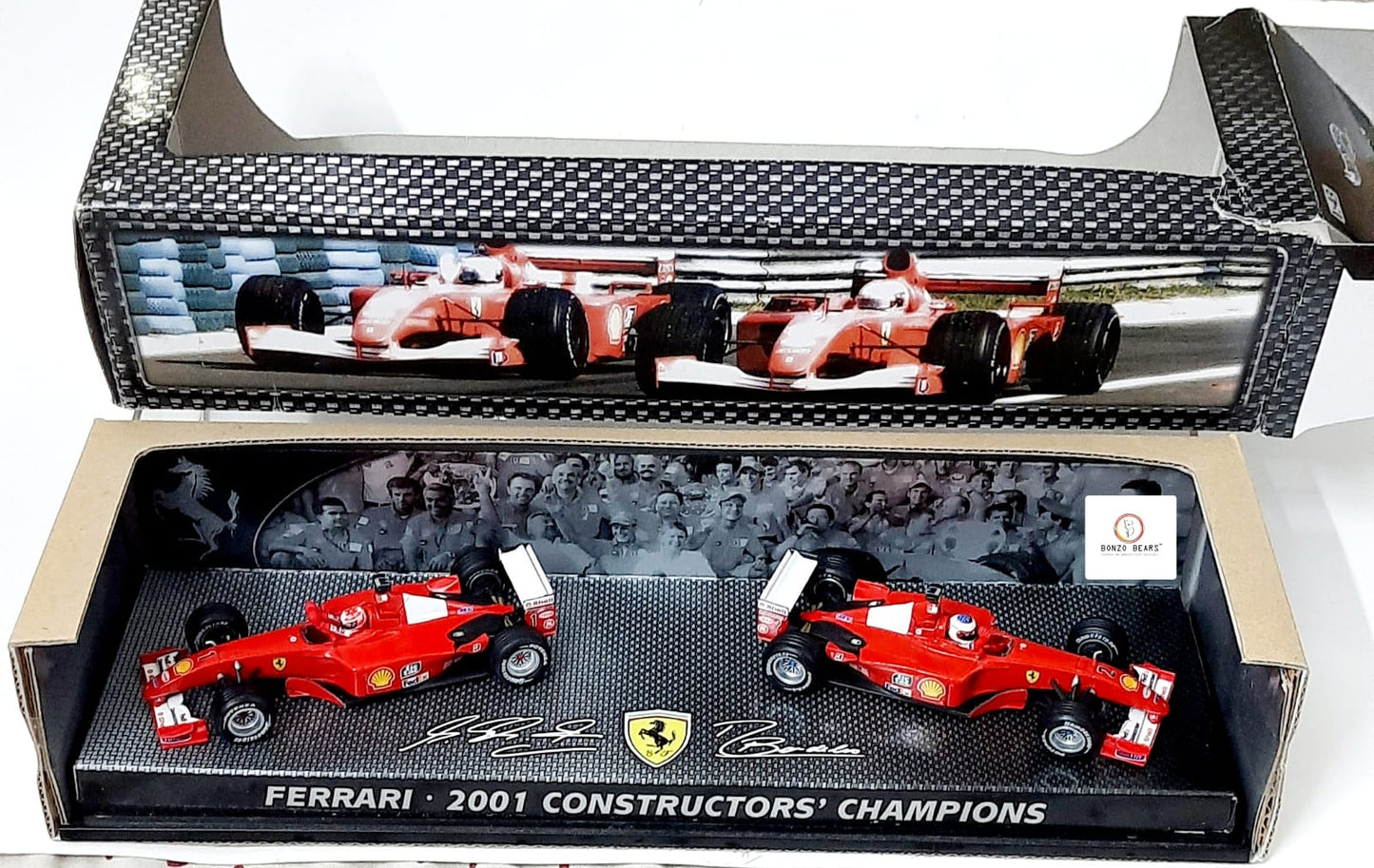 Rare Hot Wheels 1:43 Elite Formula 1 Ferrari 2001 Constructors' Champions - Ferrari's 2001 Championship victory Michael Schumacher and Rubens Barrichello with Outer Cover