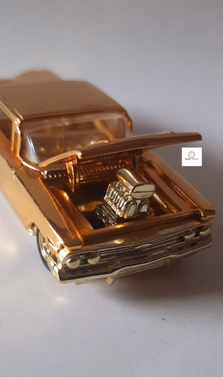 '60 Chevy Impala (24K Gold) - Racing Champions - Hot Rod Magazine 50th Anniversary Collector Series (1997 Released) (As per picture)