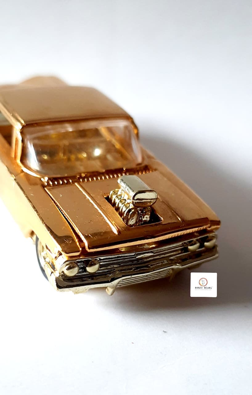 '60 Chevy Impala (24K Gold) - Racing Champions - Hot Rod Magazine 50th Anniversary Collector Series (1997 Released) (As per picture)