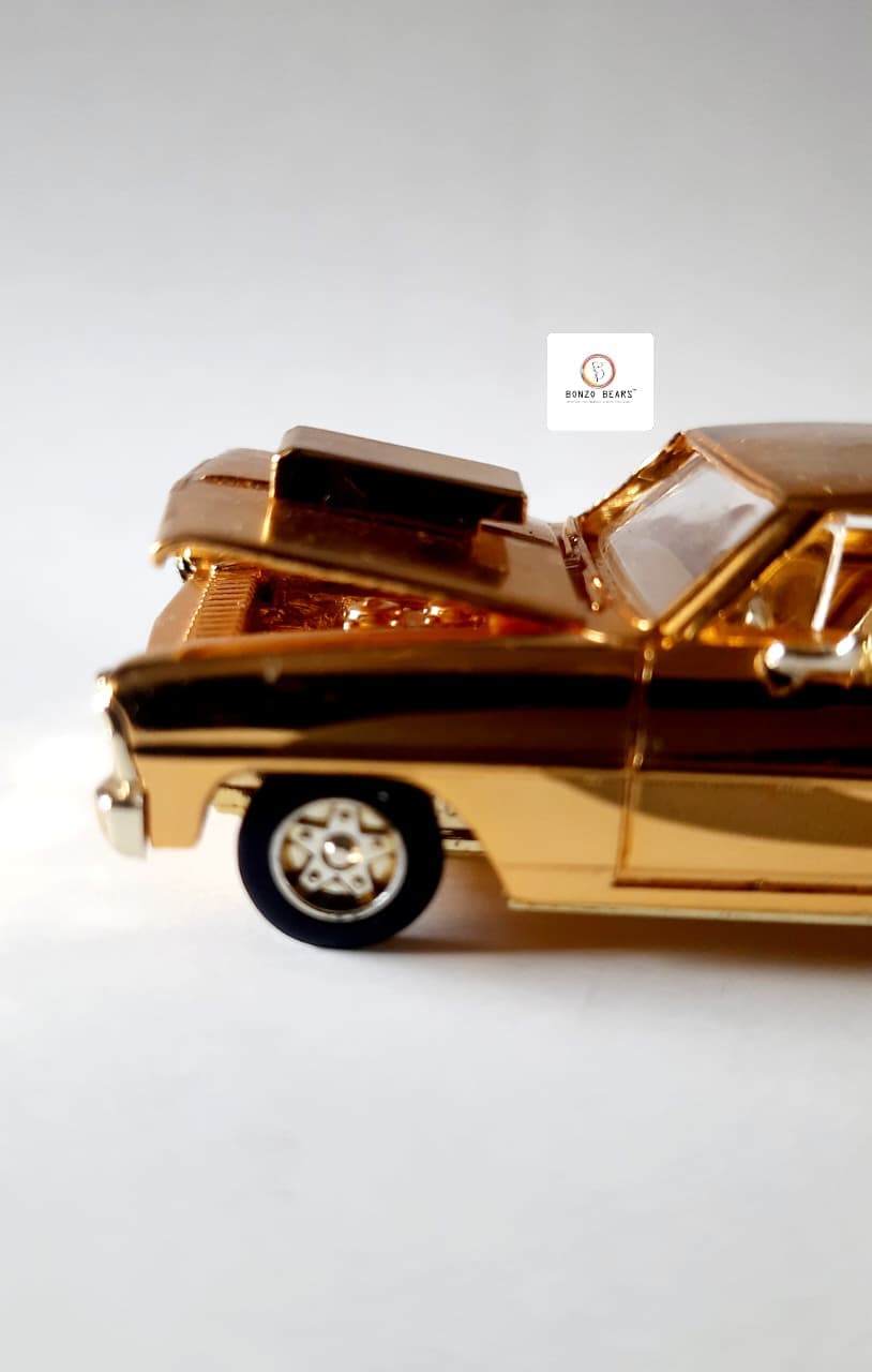 '66 Chevy Nova (24K Gold) - Racing Champions - Hot Rod Magazine 50th Anniversary Collector Series (1997 Released) (As per picture)