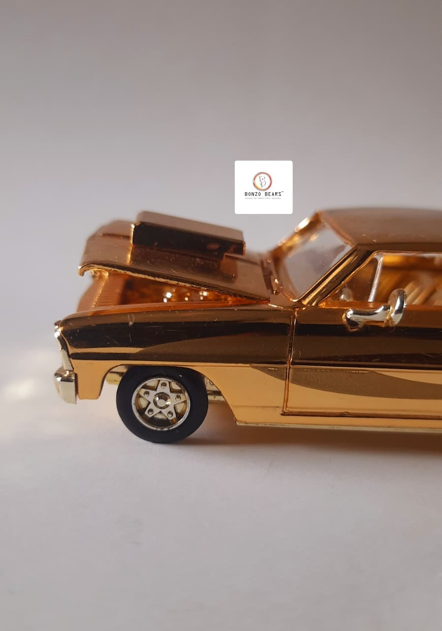 '66 Chevy Nova (24K Gold) - Racing Champions - Hot Rod Magazine 50th Anniversary Collector Series (1997 Released) (As per picture)