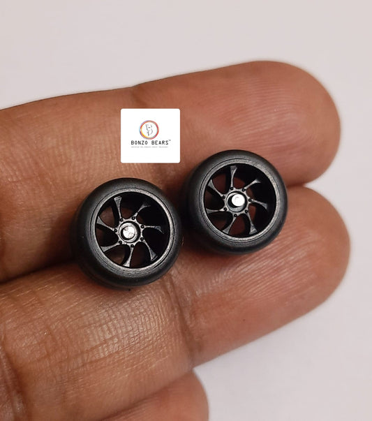 Rubber Tyre - 10 mm Black Rim 7 Spoke - 28mm Axle, Cv3