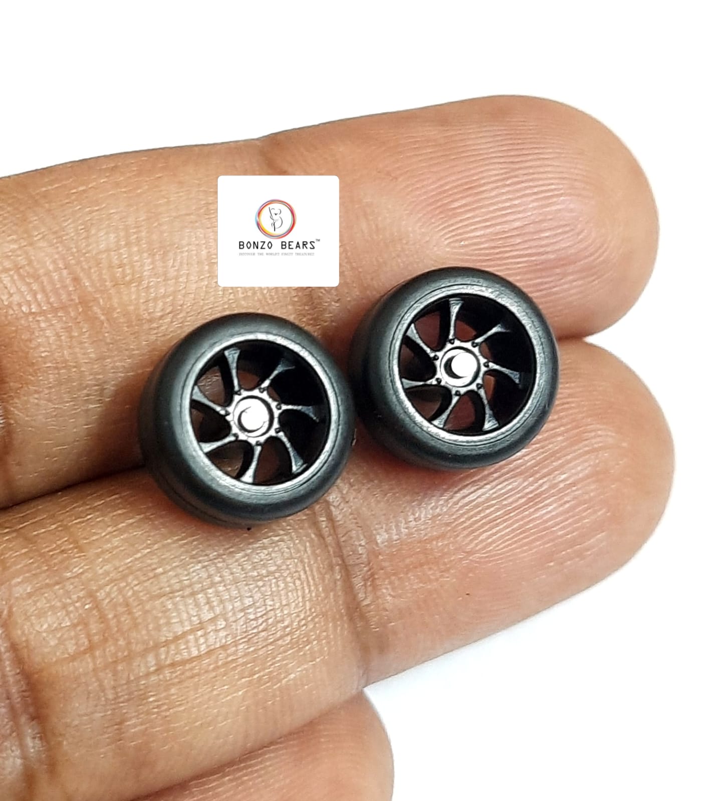 Rubber Tyre - 10 mm Black Rim 7 Spoke - 28mm Axle, Cv3
