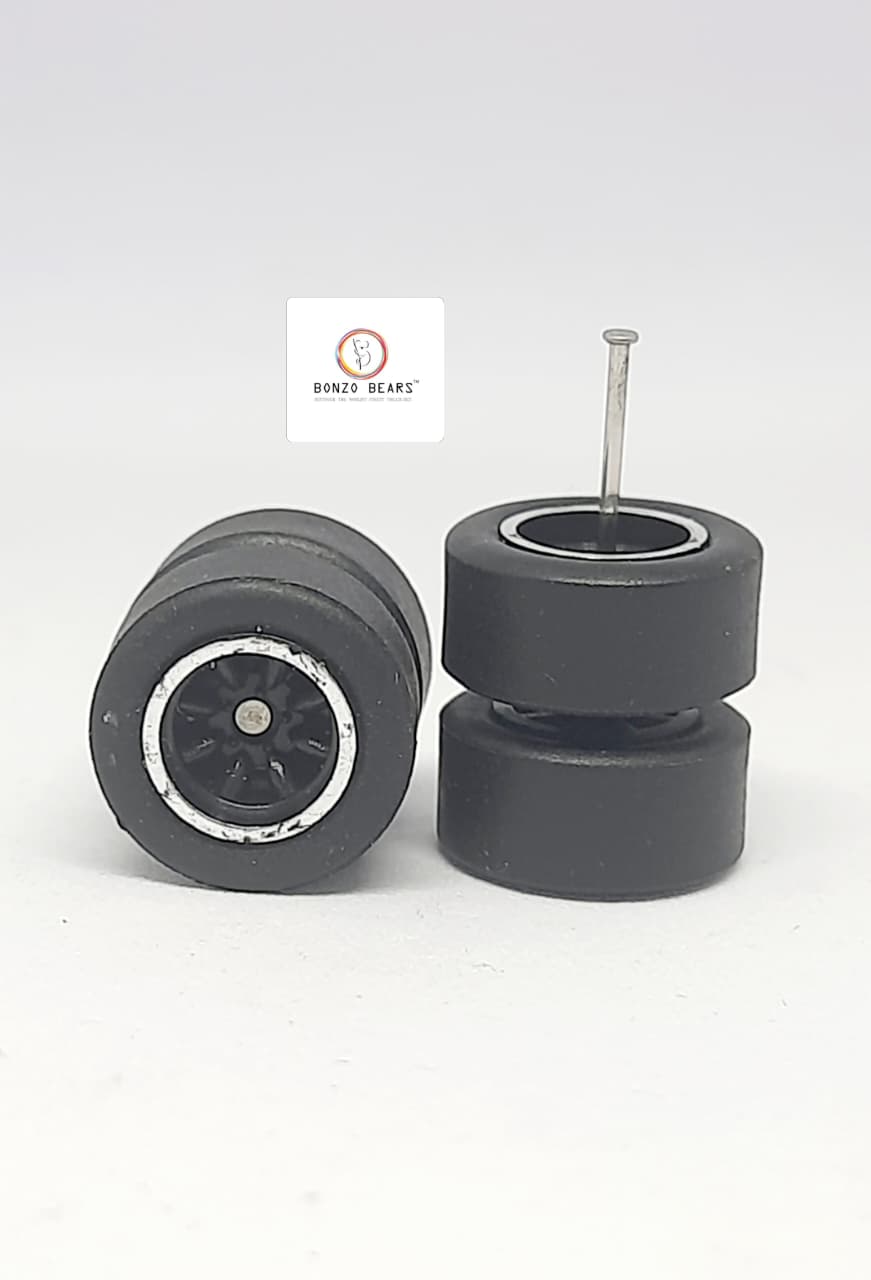 Rubber Tire - 12mm , Chrome lined Multispoked spoked Black Rim 25mm Axle