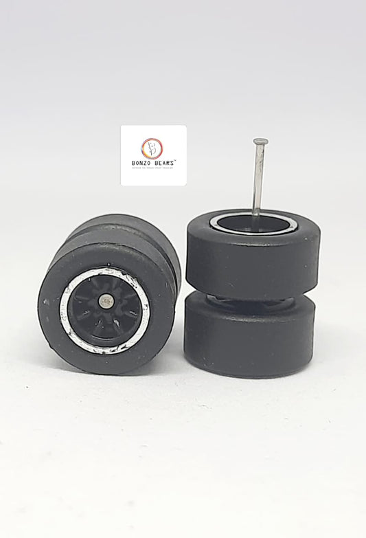 Rubber Tire - 12mm , Chrome lined Multispoked spoked Black Rim 25mm Axle
