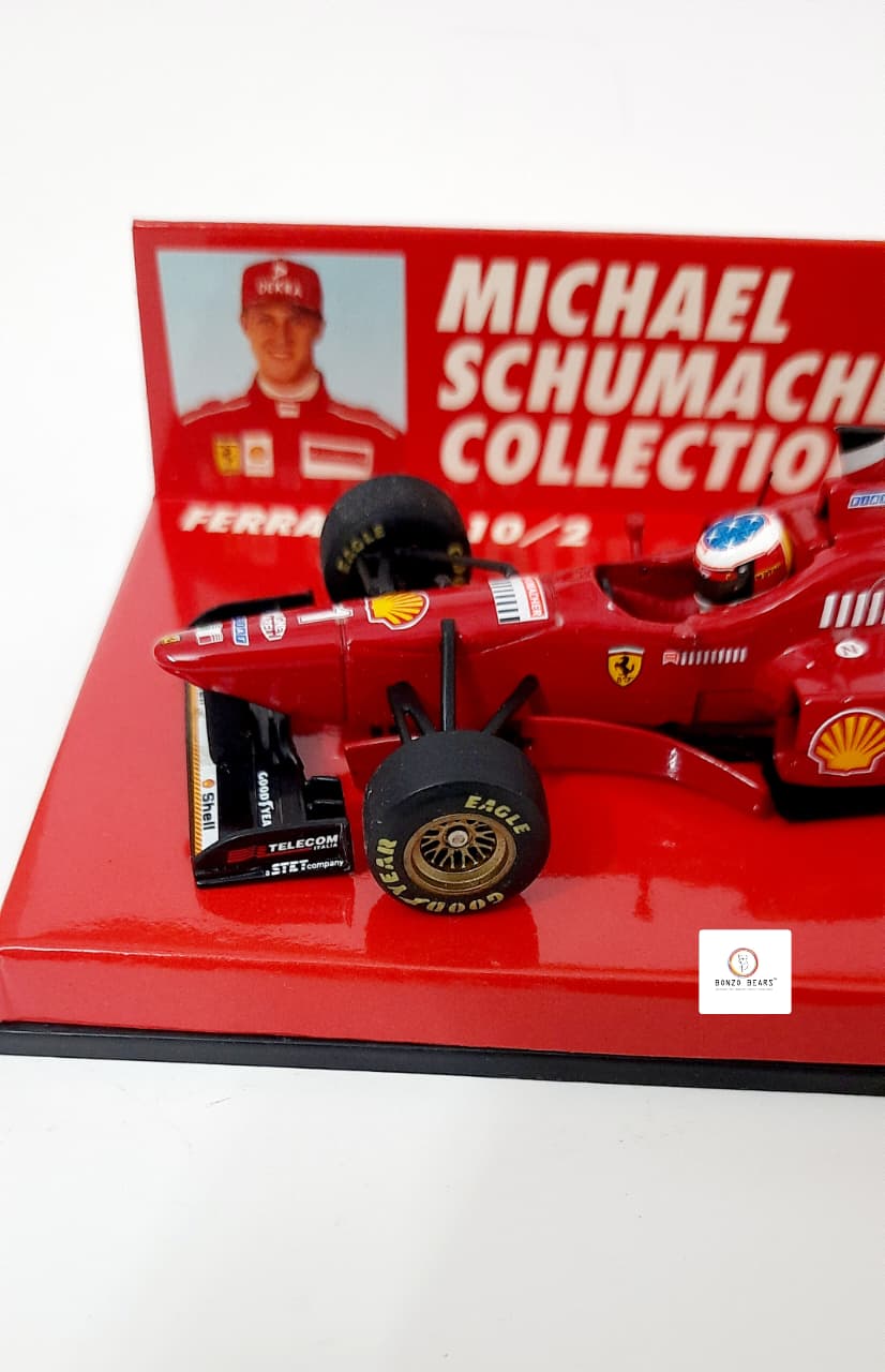 Mini Champs 1:43 1996 Ferrari F310/2 - "Michael Schumacher Collection" | Bonzo Bears