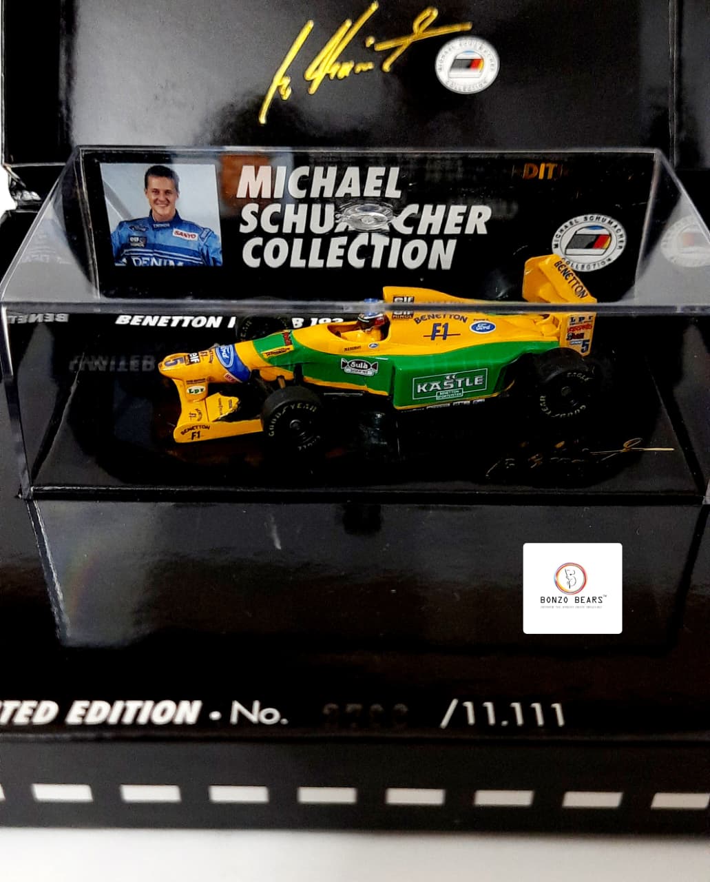 Limited Edition 2766/11111 1:64 Mini Champs 1993 Benetton Ford B193B "Michael Schumacher Collection" - | Bonzo Bears