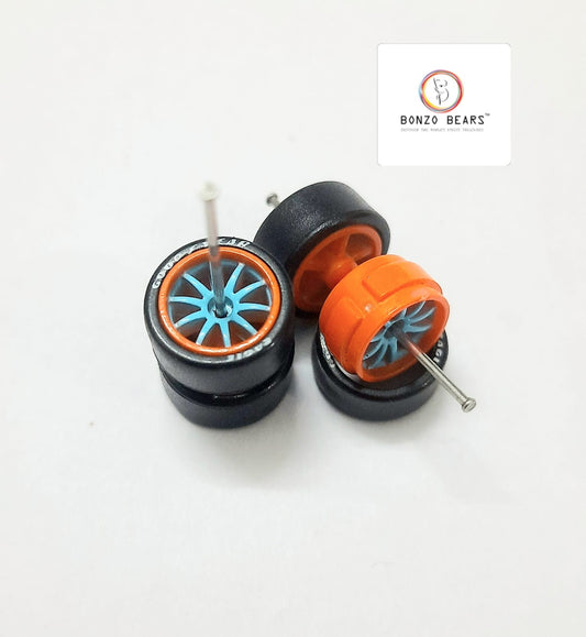 Rubber Tyre - 10mm, Orange Rim Blue Multispoke with Goodyear Eagle - 25mm axle | Cv1