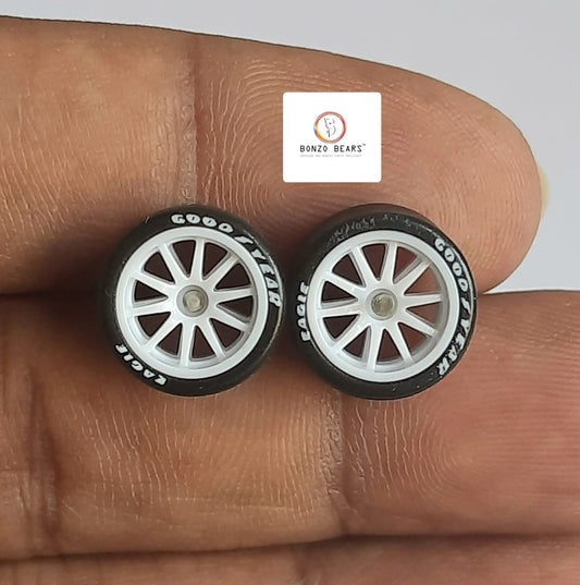 Rubber Tyre - 10mm White Rim 10 spoke with Goodyear Eagle - 25mm Axle Cv1