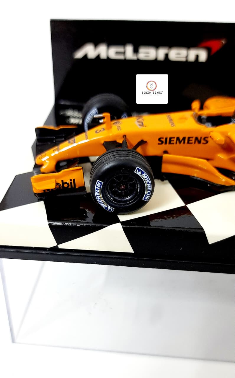 Limited edition - Rare Minichamps - 1/43  McLaren Mercedes MP4-21 - Kimi Räikkönen "Interim Livery" 2006 (Papaya Orange Testing Livery)