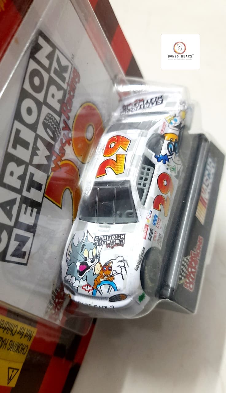 Rare -1997 Racing Champions - NASCAR #29 Cartoon Network / Tom & Jerry Chevrolet Monte Carlo driven by Jeff Green (Includes Collector Card & Display Base)