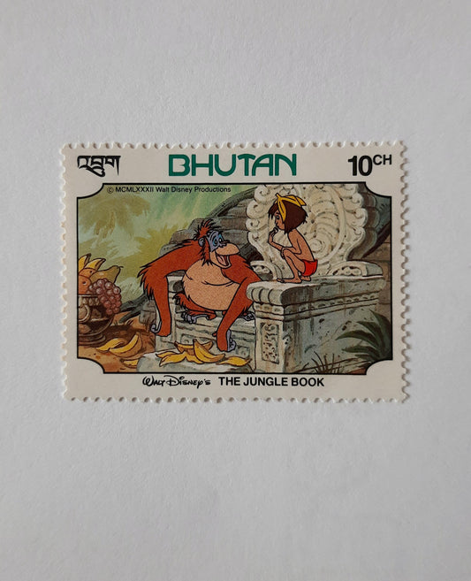 1982 Bhutan Stamp |Mint  King Louie and Mowgli from Disney's The Jungle Book - Stamp SB1